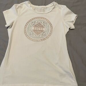 Authentic Guess Ladies Tshirt. Cotton spandex size Medium Cinching ties
